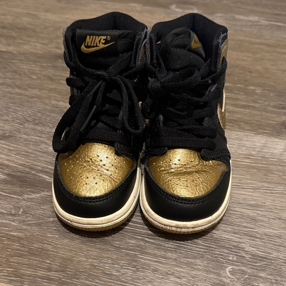 Nike Air Jordan Sneakers in Black and Gold